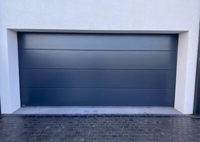 Sectional garage door installer